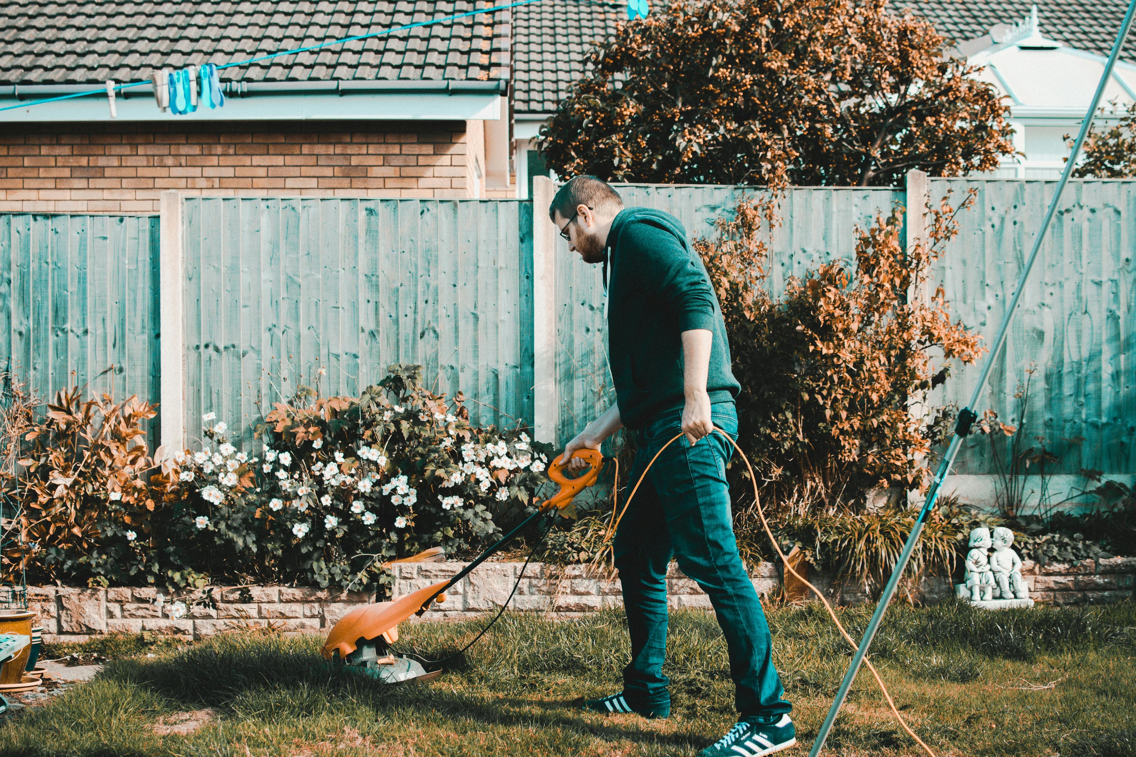 Person mowing lawn